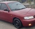 Красный Дэу Нубира, объемом двигателя 1.6 л и пробегом 200 тыс. км за 2655 $, фото 6 на Automoto.ua