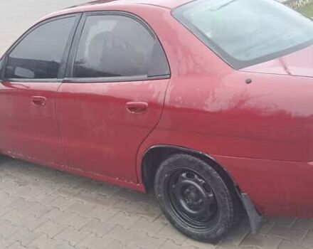 Красный Дэу Нубира, объемом двигателя 1.6 л и пробегом 200 тыс. км за 2655 $, фото 5 на Automoto.ua