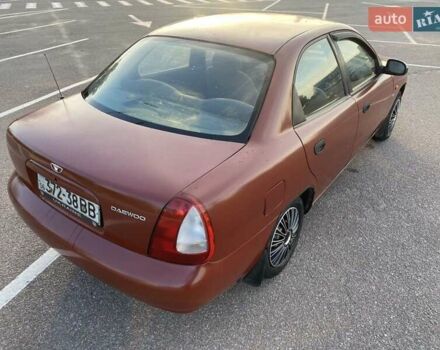 Красный Дэу Нубира, объемом двигателя 2 л и пробегом 300 тыс. км за 1100 $, фото 7 на Automoto.ua