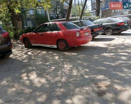 Червоний Деу Нубіра, об'ємом двигуна 1.6 л та пробігом 320 тис. км за 1200 $, фото 9 на Automoto.ua