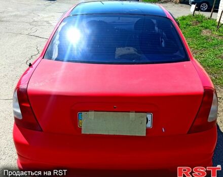 Красный Дэу Нубира, объемом двигателя 1.6 л и пробегом 195 тыс. км за 3500 $, фото 2 на Automoto.ua