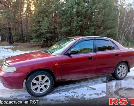 Червоний Деу Нубіра, об'ємом двигуна 1.6 л та пробігом 185 тис. км за 1350 $, фото 6 на Automoto.ua