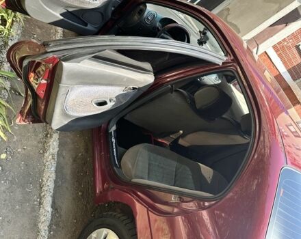 Красный Дэу Нубира, объемом двигателя 1.6 л и пробегом 284 тыс. км за 1600 $, фото 6 на Automoto.ua