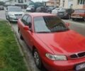 Красный Дэу Нубира, объемом двигателя 1.6 л и пробегом 245 тыс. км за 1250 $, фото 1 на Automoto.ua