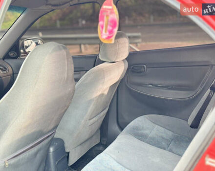 Червоний Деу Нубіра, об'ємом двигуна 1.6 л та пробігом 180 тис. км за 1750 $, фото 9 на Automoto.ua