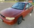 Красный Дэу Нубира, объемом двигателя 2 л и пробегом 300 тыс. км за 1100 $, фото 9 на Automoto.ua