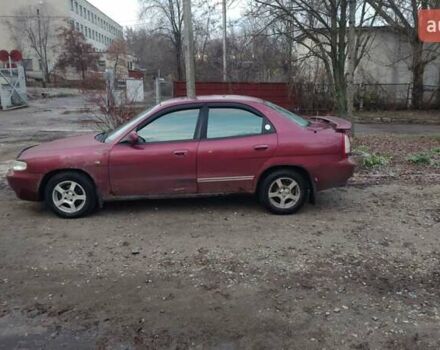 Червоний Деу Нубіра, об'ємом двигуна 1.6 л та пробігом 300 тис. км за 1200 $, фото 4 на Automoto.ua