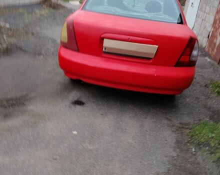 Червоний Деу Нубіра, об'ємом двигуна 1.6 л та пробігом 390 тис. км за 1939 $, фото 1 на Automoto.ua