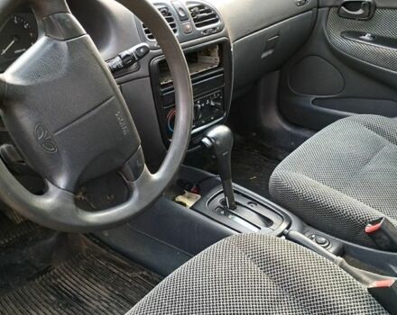 Красный Дэу Нубира, объемом двигателя 2 л и пробегом 200 тыс. км за 1100 $, фото 3 на Automoto.ua