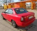 Красный Дэу Нубира, объемом двигателя 1.6 л и пробегом 250 тыс. км за 334 $, фото 1 на Automoto.ua