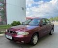 Красный Дэу Нубира, объемом двигателя 1.6 л и пробегом 195 тыс. км за 1650 $, фото 3 на Automoto.ua