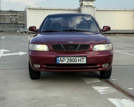 Красный Дэу Нубира, объемом двигателя 1.6 л и пробегом 234 тыс. км за 1650 $, фото 1 на Automoto.ua