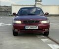 Красный Дэу Нубира, объемом двигателя 1.6 л и пробегом 234 тыс. км за 1650 $, фото 1 на Automoto.ua
