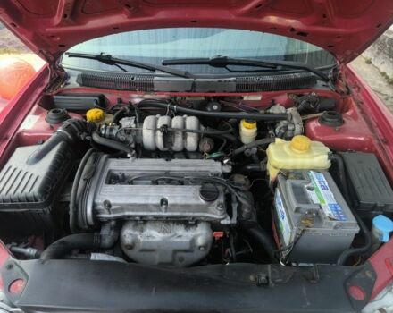 Красный Дэу Нубира, объемом двигателя 1.6 л и пробегом 330 тыс. км за 1100 $, фото 7 на Automoto.ua