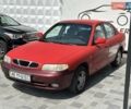 Красный Дэу Нубира, объемом двигателя 1.6 л и пробегом 300 тыс. км за 1500 $, фото 2 на Automoto.ua