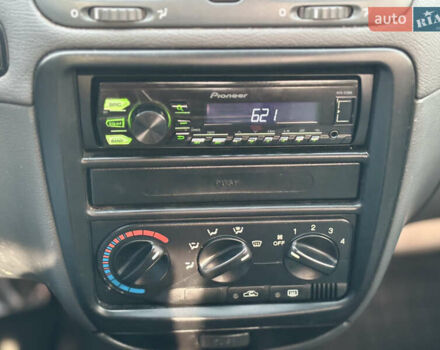 Червоний Деу Нубіра, об'ємом двигуна 1.6 л та пробігом 180 тис. км за 1750 $, фото 10 на Automoto.ua