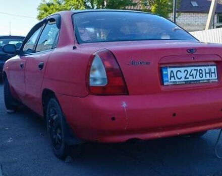 Красный Дэу Нубира, объемом двигателя 1.6 л и пробегом 346 тыс. км за 1500 $, фото 3 на Automoto.ua