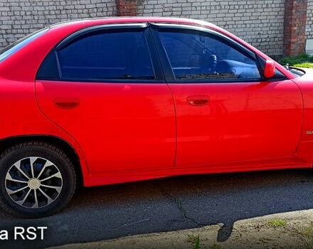 Красный Дэу Нубира, объемом двигателя 1.6 л и пробегом 195 тыс. км за 3500 $, фото 4 на Automoto.ua