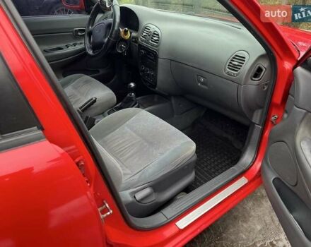 Червоний Деу Нубіра, об'ємом двигуна 1.6 л та пробігом 331 тис. км за 2350 $, фото 3 на Automoto.ua