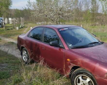 Красный Дэу Нубира, объемом двигателя 2 л и пробегом 200 тыс. км за 1100 $, фото 4 на Automoto.ua