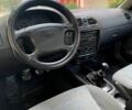 Красный Дэу Нубира, объемом двигателя 1.6 л и пробегом 195 тыс. км за 1650 $, фото 5 на Automoto.ua