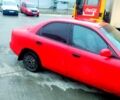 Красный Дэу Нубира, объемом двигателя 1.6 л и пробегом 205 тыс. км за 800 $, фото 1 на Automoto.ua