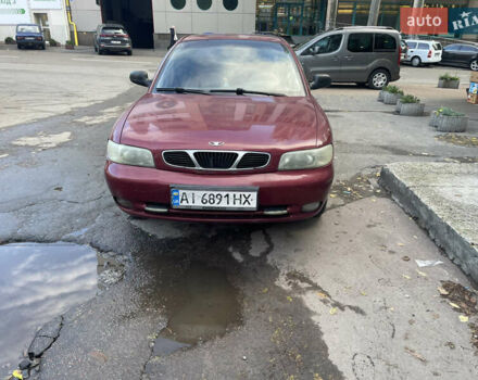 Деу Нубіра 1998 у Києві на Automoto.ua Червоний Деу Нубіра, об'ємом двигуна 1.6 л та пробігом 100 тис. км за 1500 $, фото 1 на Automoto.ua