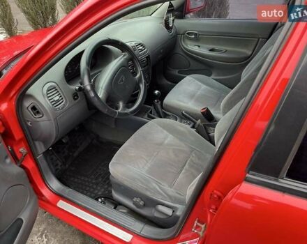 Червоний Деу Нубіра, об'ємом двигуна 1.6 л та пробігом 331 тис. км за 2350 $, фото 5 на Automoto.ua