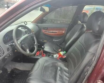 Красный Дэу Нубира, объемом двигателя 1.6 л и пробегом 200 тыс. км за 2655 $, фото 9 на Automoto.ua