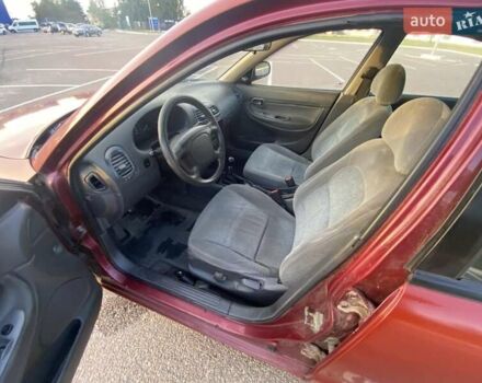 Красный Дэу Нубира, объемом двигателя 2 л и пробегом 300 тыс. км за 1100 $, фото 16 на Automoto.ua