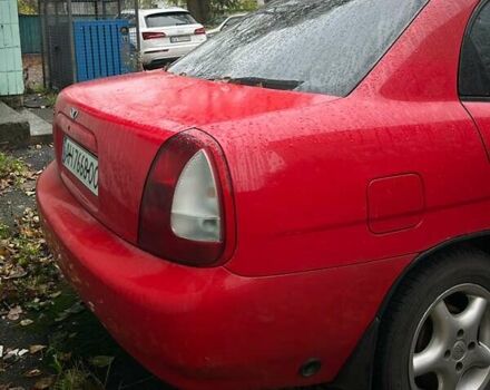 Червоний Деу Нубіра, об'ємом двигуна 1.6 л та пробігом 230 тис. км за 1100 $, фото 4 на Automoto.ua