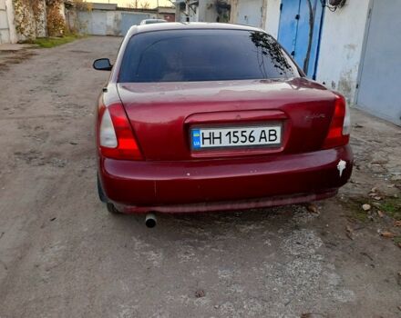 Красный Дэу Нубира, объемом двигателя 1.6 л и пробегом 580 тыс. км за 1100 $, фото 2 на Automoto.ua