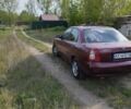 Красный Дэу Нубира, объемом двигателя 2 л и пробегом 200 тыс. км за 1100 $, фото 5 на Automoto.ua