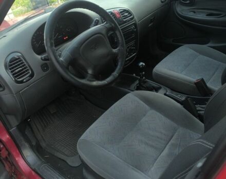 Красный Дэу Нубира, объемом двигателя 1.6 л и пробегом 330 тыс. км за 1100 $, фото 6 на Automoto.ua