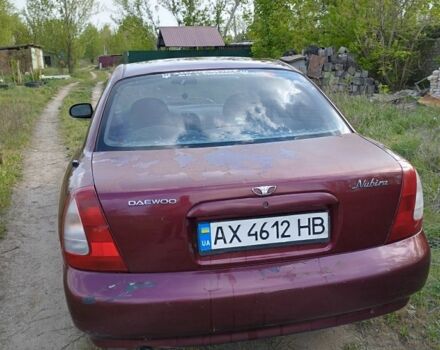 Красный Дэу Нубира, объемом двигателя 2 л и пробегом 200 тыс. км за 1100 $, фото 1 на Automoto.ua