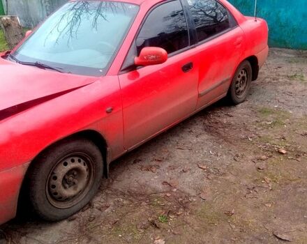 Червоний Деу Нубіра, об'ємом двигуна 1.6 л та пробігом 0 тис. км за 710 $, фото 1 на Automoto.ua