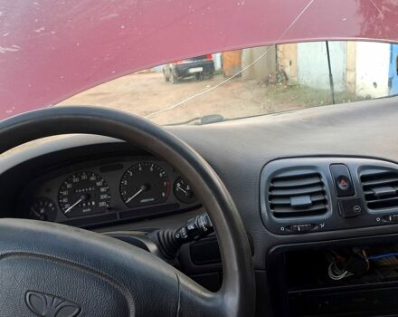 Красный Дэу Нубира, объемом двигателя 1.6 л и пробегом 580 тыс. км за 1100 $, фото 7 на Automoto.ua