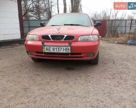 Червоний Деу Нубіра, об'ємом двигуна 1.6 л та пробігом 320 тис. км за 1200 $, фото 5 на Automoto.ua
