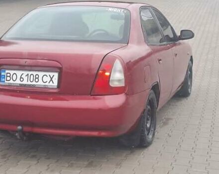 Красный Дэу Нубира, объемом двигателя 1.6 л и пробегом 200 тыс. км за 2655 $, фото 4 на Automoto.ua