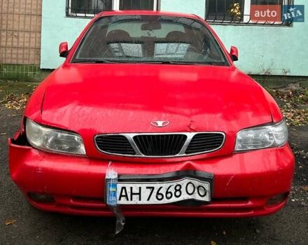 Червоний Деу Нубіра, об'ємом двигуна 1.6 л та пробігом 230 тис. км за 1100 $, фото 1 на Automoto.ua