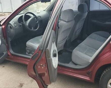 Красный Дэу Нубира, объемом двигателя 1.6 л и пробегом 275 тыс. км за 3700 $, фото 4 на Automoto.ua
