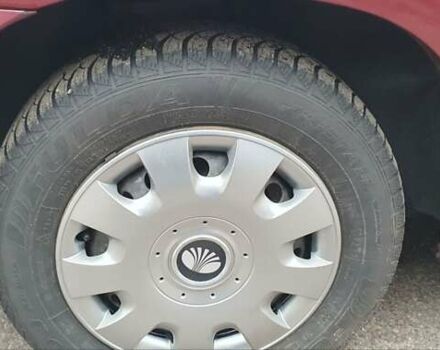 Красный Дэу Нубира, объемом двигателя 1.6 л и пробегом 275 тыс. км за 3700 $, фото 8 на Automoto.ua