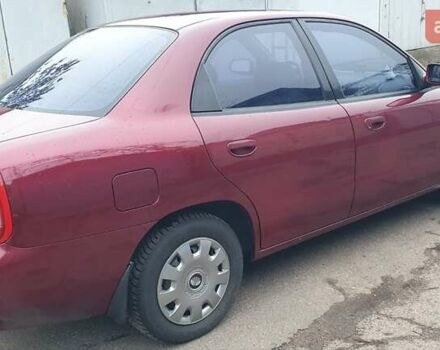 Красный Дэу Нубира, объемом двигателя 1.6 л и пробегом 275 тыс. км за 3700 $, фото 10 на Automoto.ua