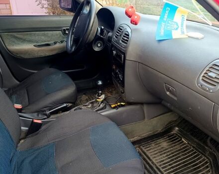 Красный Дэу Нубира, объемом двигателя 1.6 л и пробегом 183 тыс. км за 2500 $, фото 8 на Automoto.ua