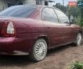 Червоний Деу Нубіра, об'ємом двигуна 1.6 л та пробігом 185 тис. км за 1600 $, фото 1 на Automoto.ua