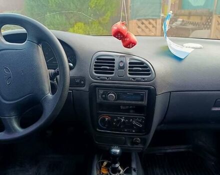 Красный Дэу Нубира, объемом двигателя 1.6 л и пробегом 183 тыс. км за 2500 $, фото 4 на Automoto.ua