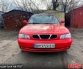Красный Дэу Нубира, объемом двигателя 1.6 л и пробегом 100 тыс. км за 1550 $, фото 1 на Automoto.ua