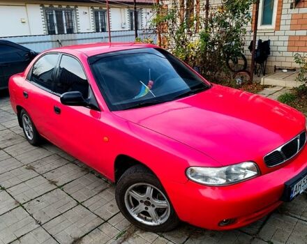 Красный Дэу Нубира, объемом двигателя 1.6 л и пробегом 183 тыс. км за 2500 $, фото 1 на Automoto.ua