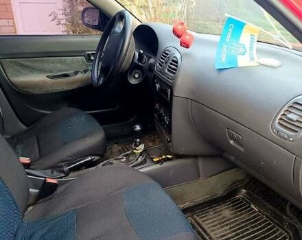 Красный Дэу Нубира, объемом двигателя 1.6 л и пробегом 183 тыс. км за 2500 $, фото 7 на Automoto.ua