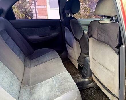 Красный Дэу Нубира, объемом двигателя 1.6 л и пробегом 183 тыс. км за 2500 $, фото 8 на Automoto.ua